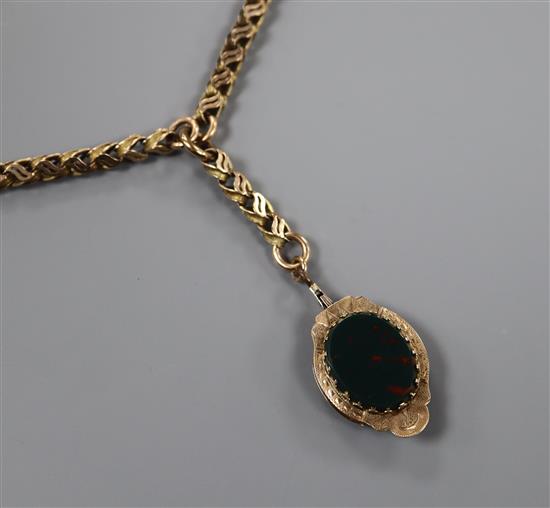 A 9c fancy twisted-link pendant necklace with shaped oval seal drop set bloodstone and agate matrices approx. 60cm,